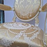 Louis XVI style cabriolet armchair with decorated medallion