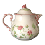 Old white and pink teapot