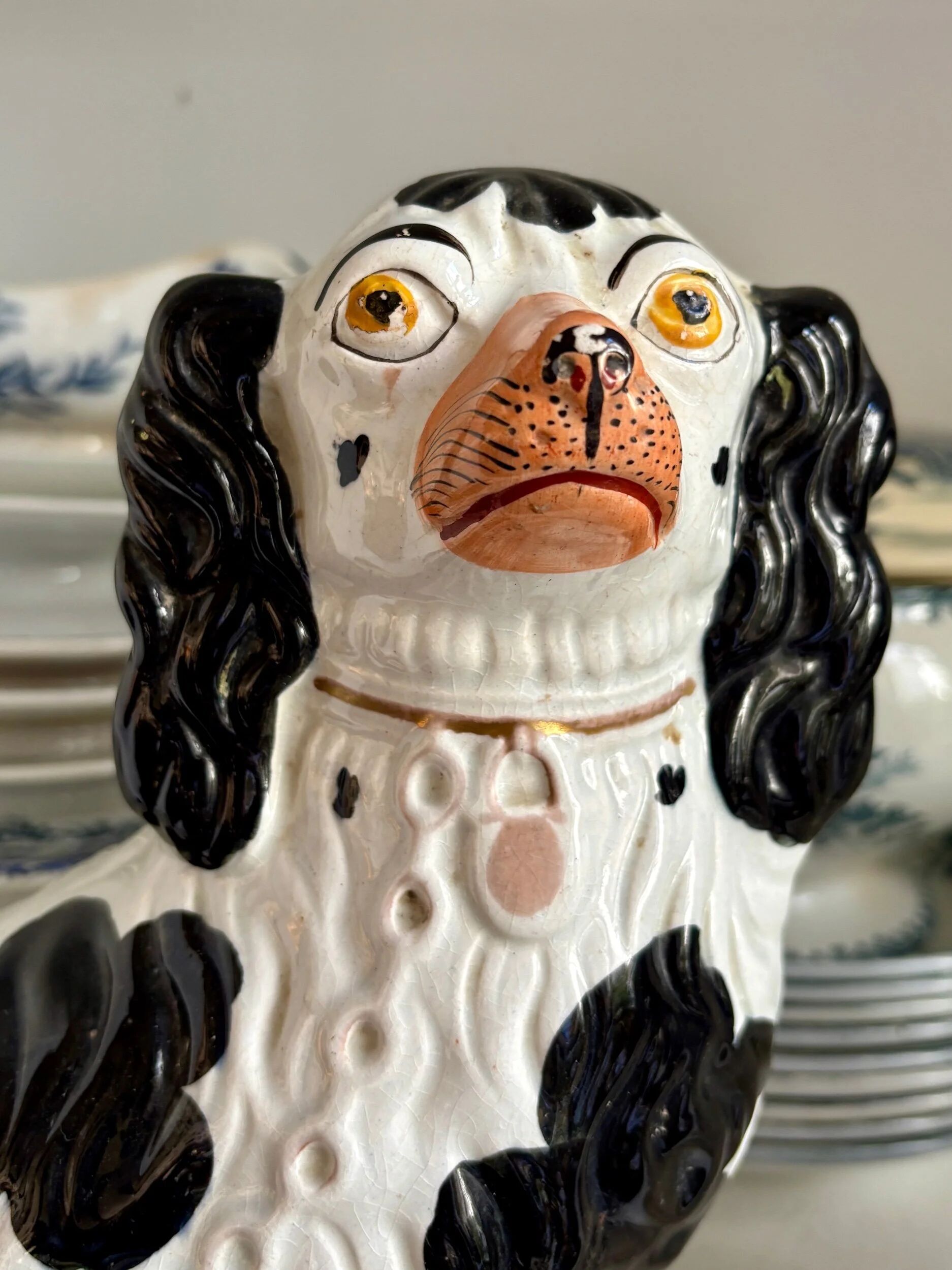 Pair of black Cavalier King Charles dogs in Staffordshire pottery, 19th century.