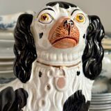 Pair of black Cavalier King Charles dogs in Staffordshire pottery, 19th century.