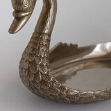 Metal swan emptier