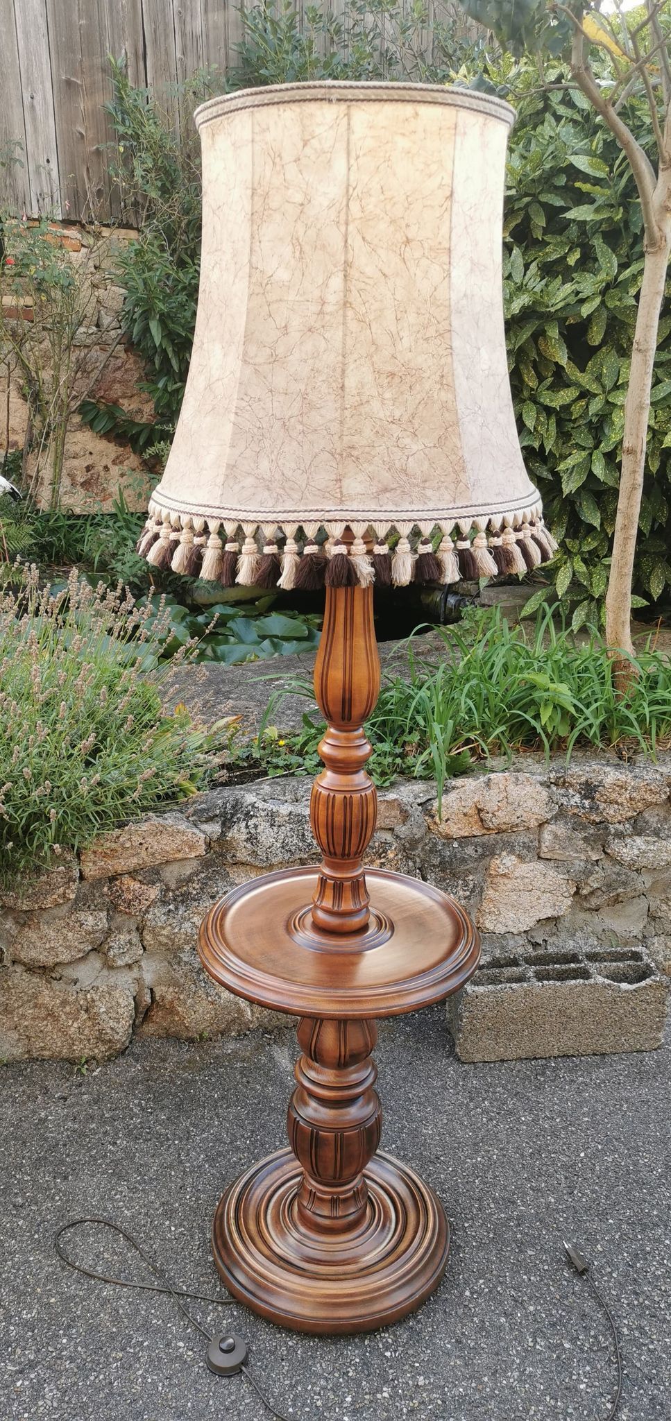 Turned wooden floor lamp with lampshade