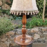 Turned wooden floor lamp with lampshade