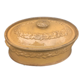 Old terrine in glazed stoneware and floral decoration mustard yellow slip