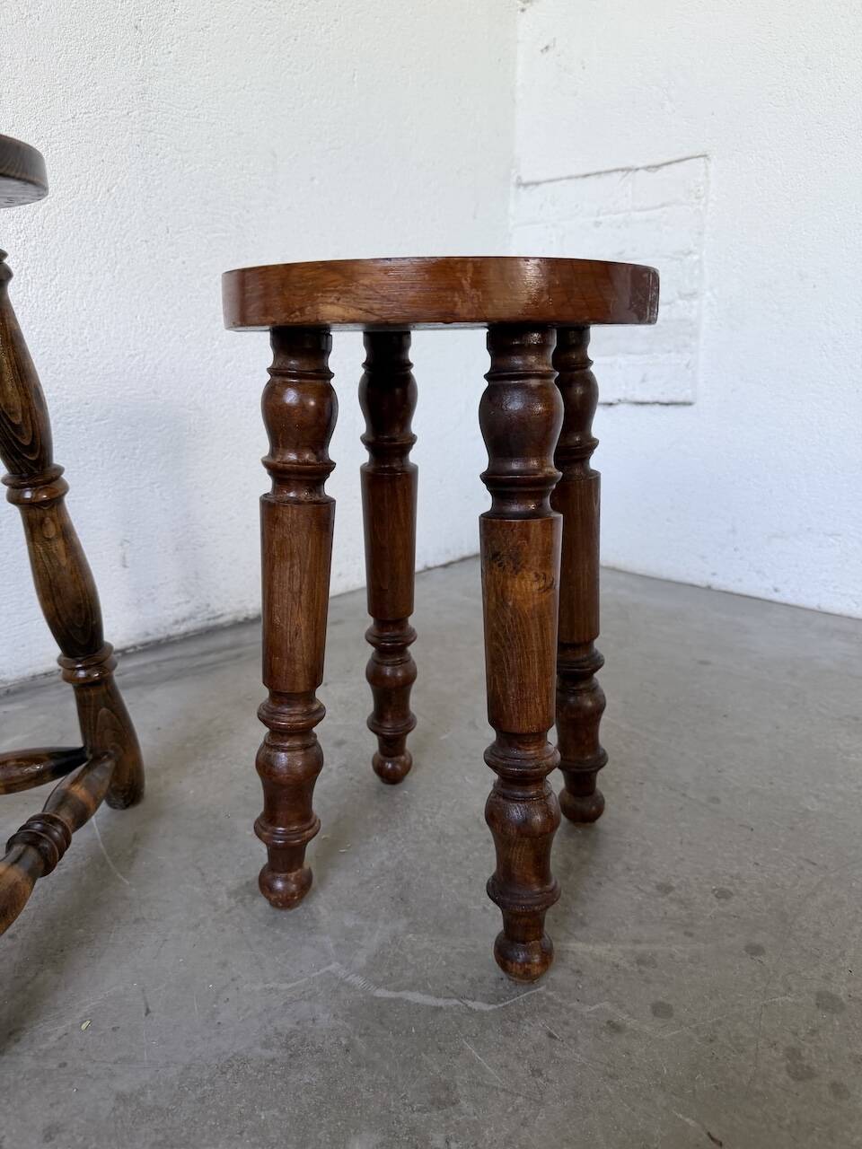 Pair of antique stools with turned legs.