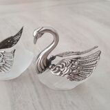 Two frosted glass swan salt cellars with silver plating.