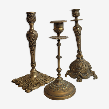 Trio brass candlesticks