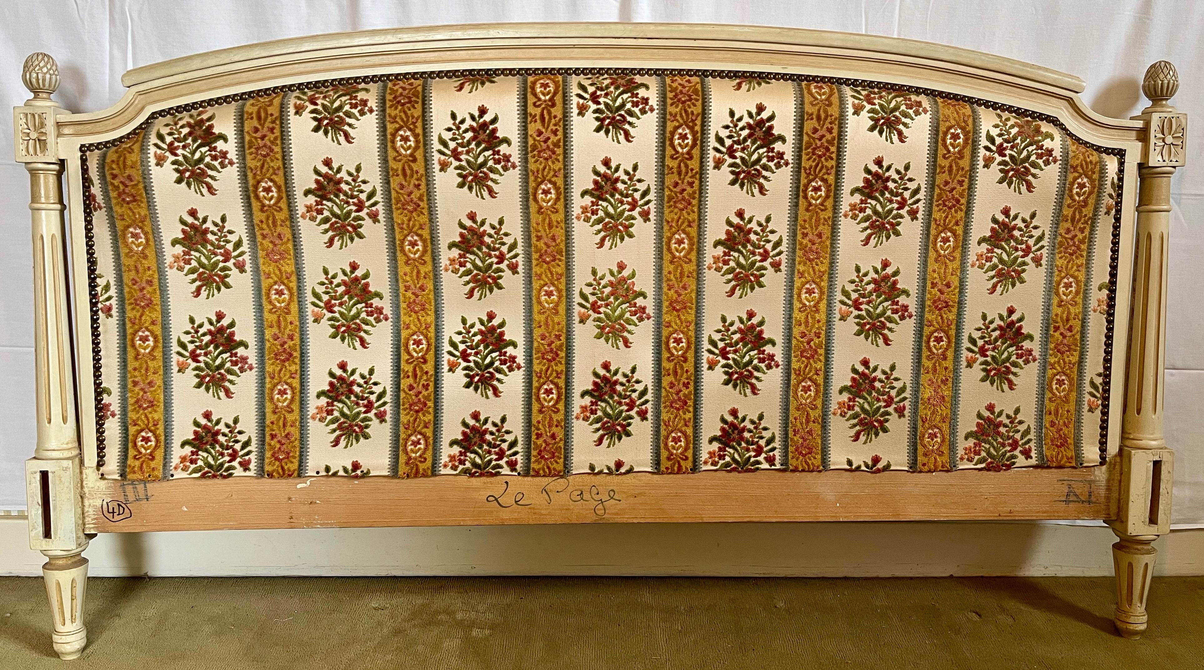 Louis XVI style bed in patinated wood with fluted columns.