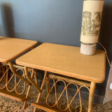 A pair of rattan bedside tables.