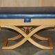 David Linley Hall bench in ostrich leather and satinwood with storage.