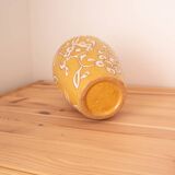 Yellow enamel vase with white flower decoration