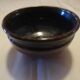 Enamelled ceramic cup