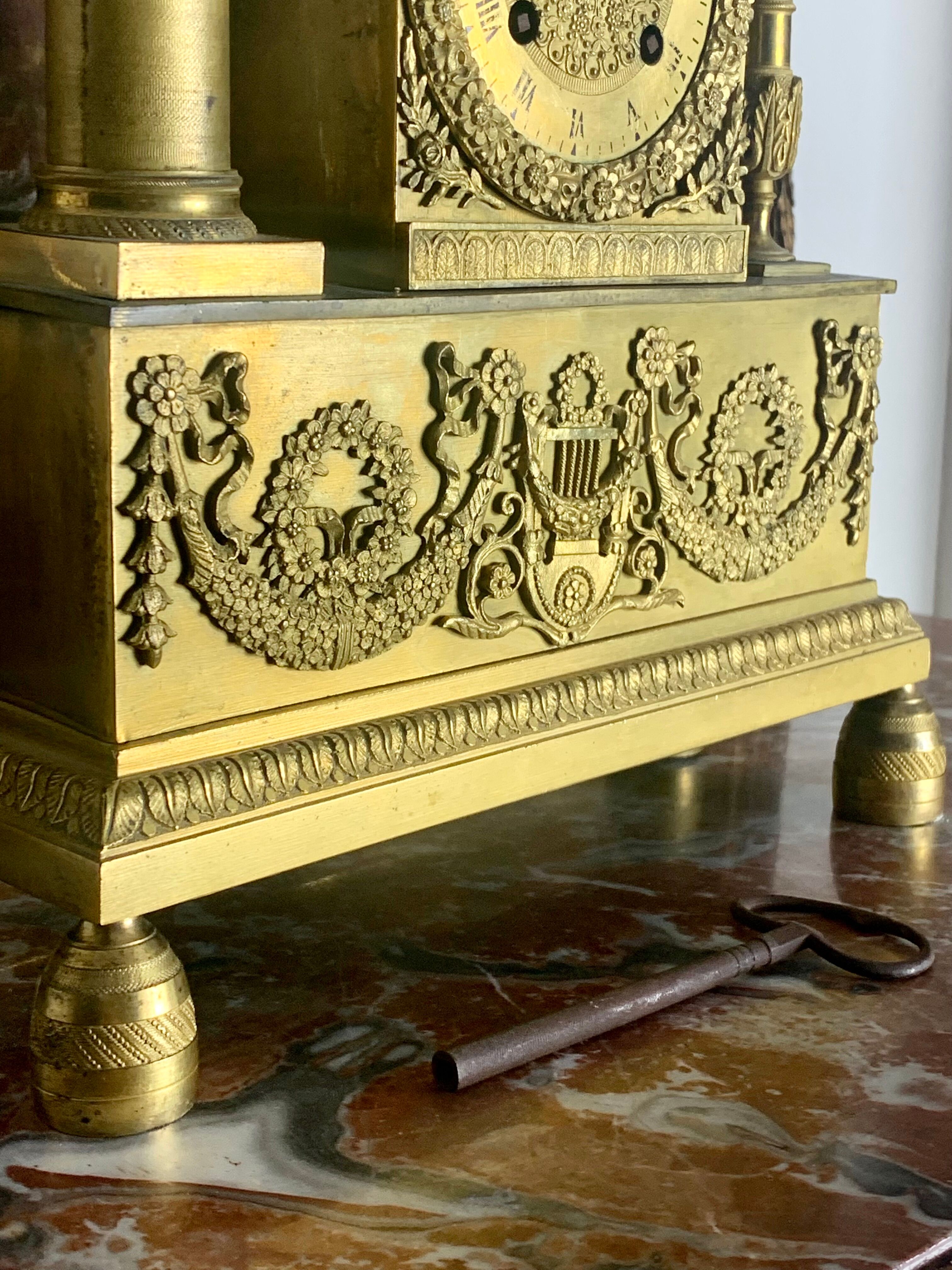 Period clock restoration in gilded bronze