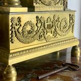 Period clock restoration in gilded bronze