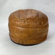 Round leather pouf De Sede from the 1970s.