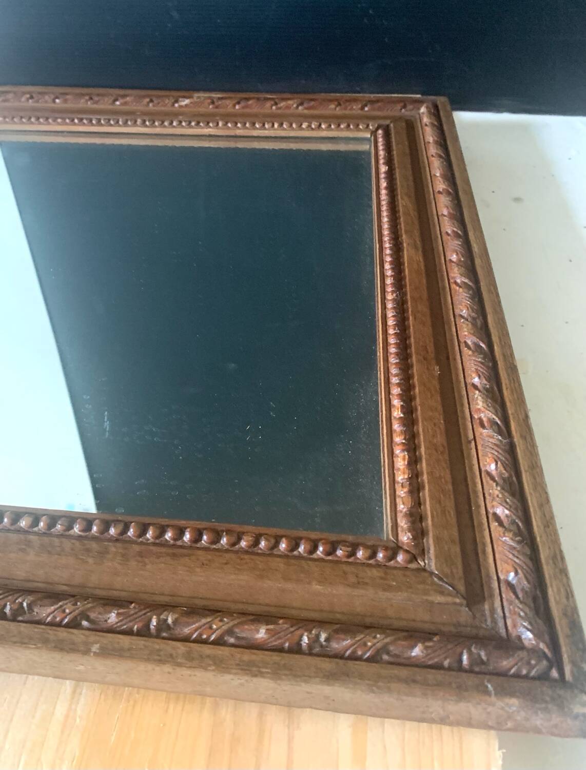 Old wooden frame mirror