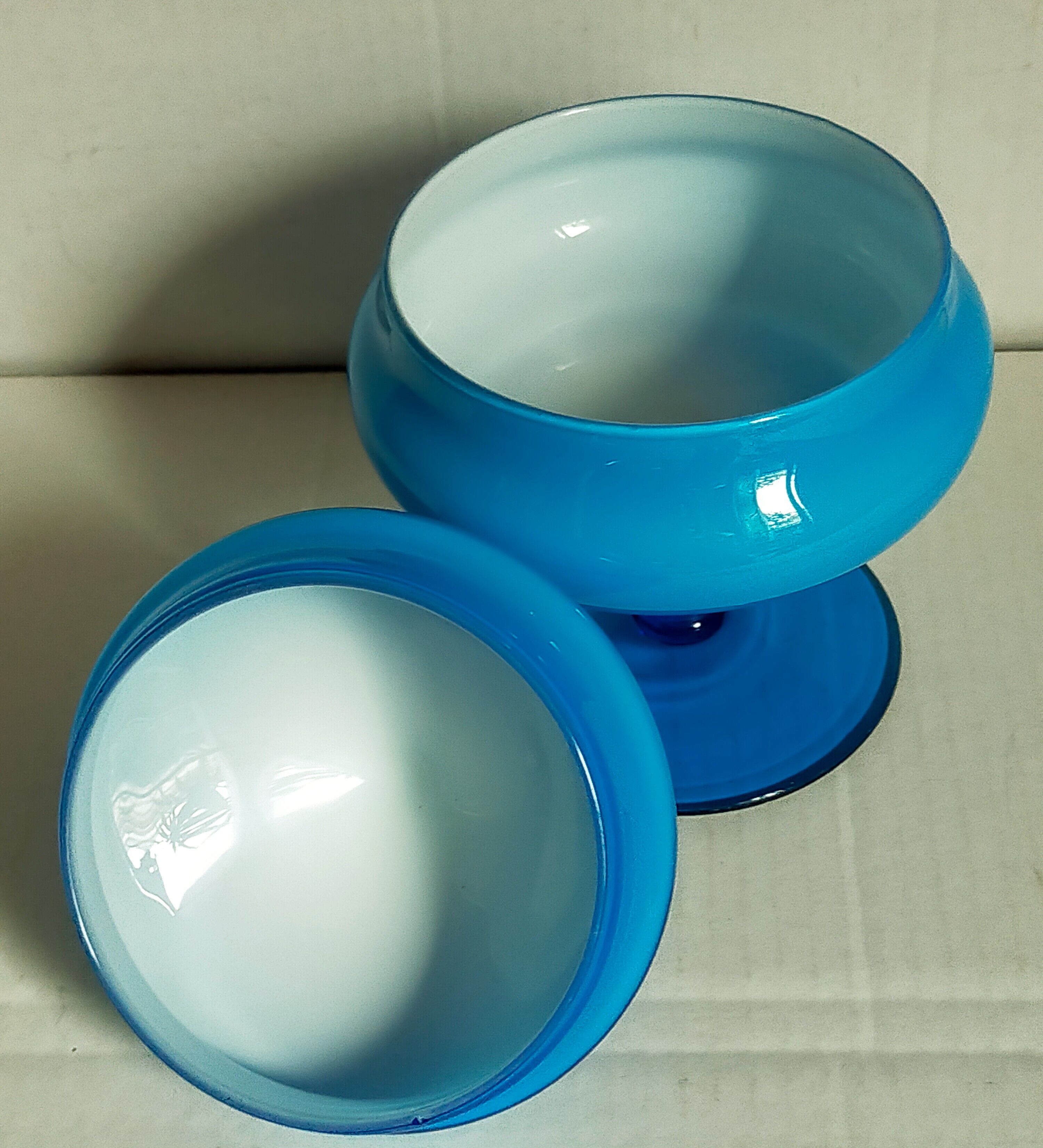 Covered pot on foot in vintage blue opaline