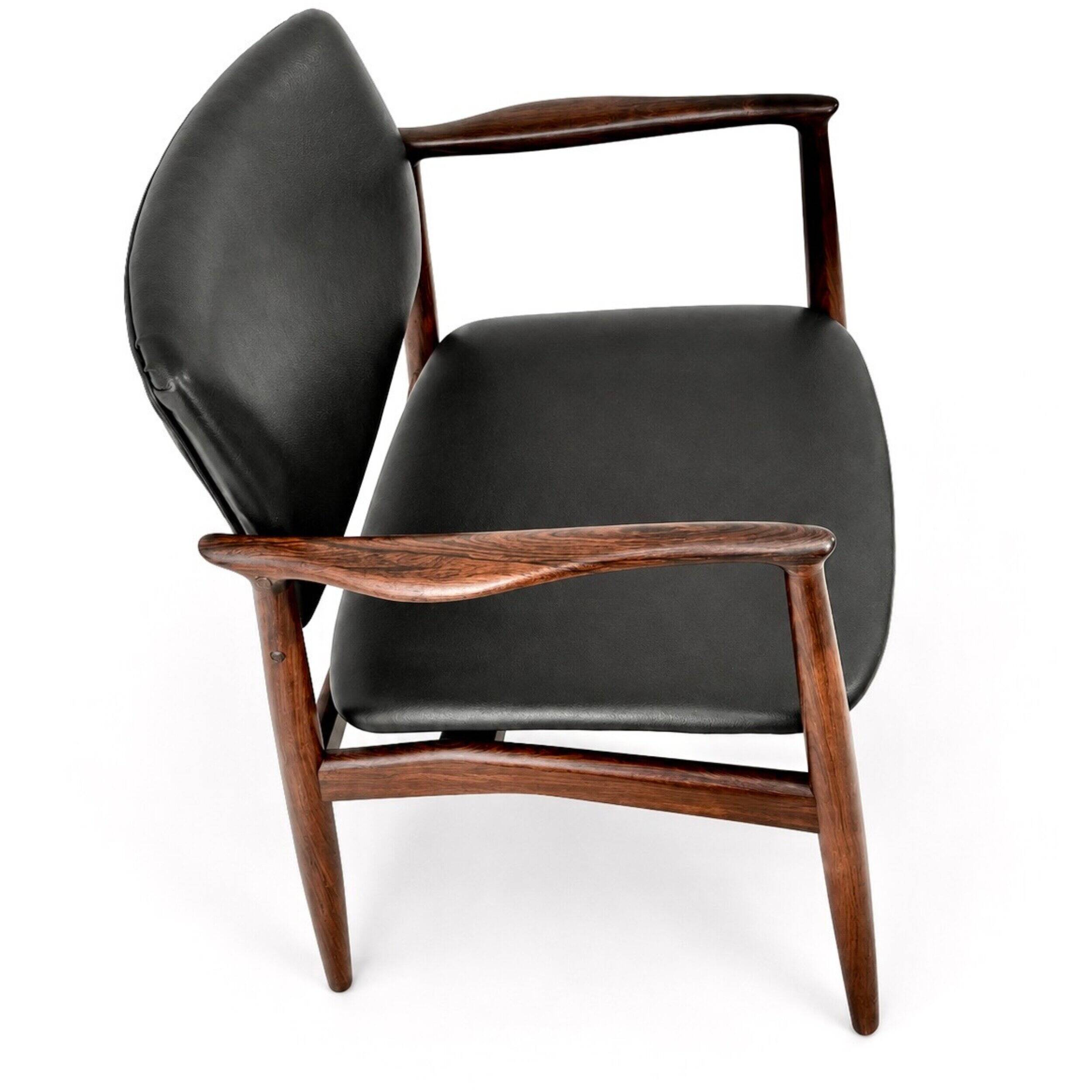 Captain armchair in rosewood by Erik Buch