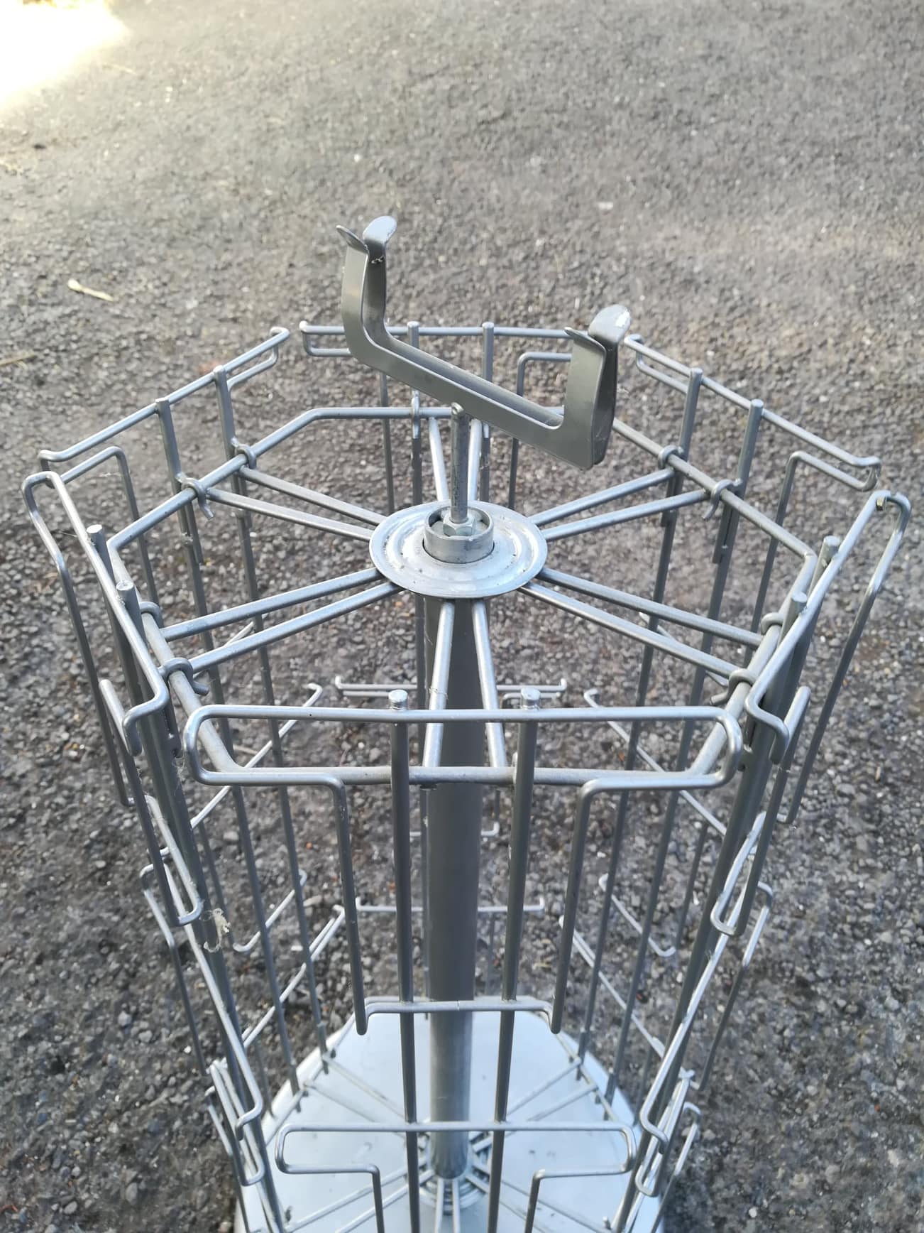 Postcard turnstile display in silver metal