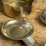 Individual brass ashtrays with storage support