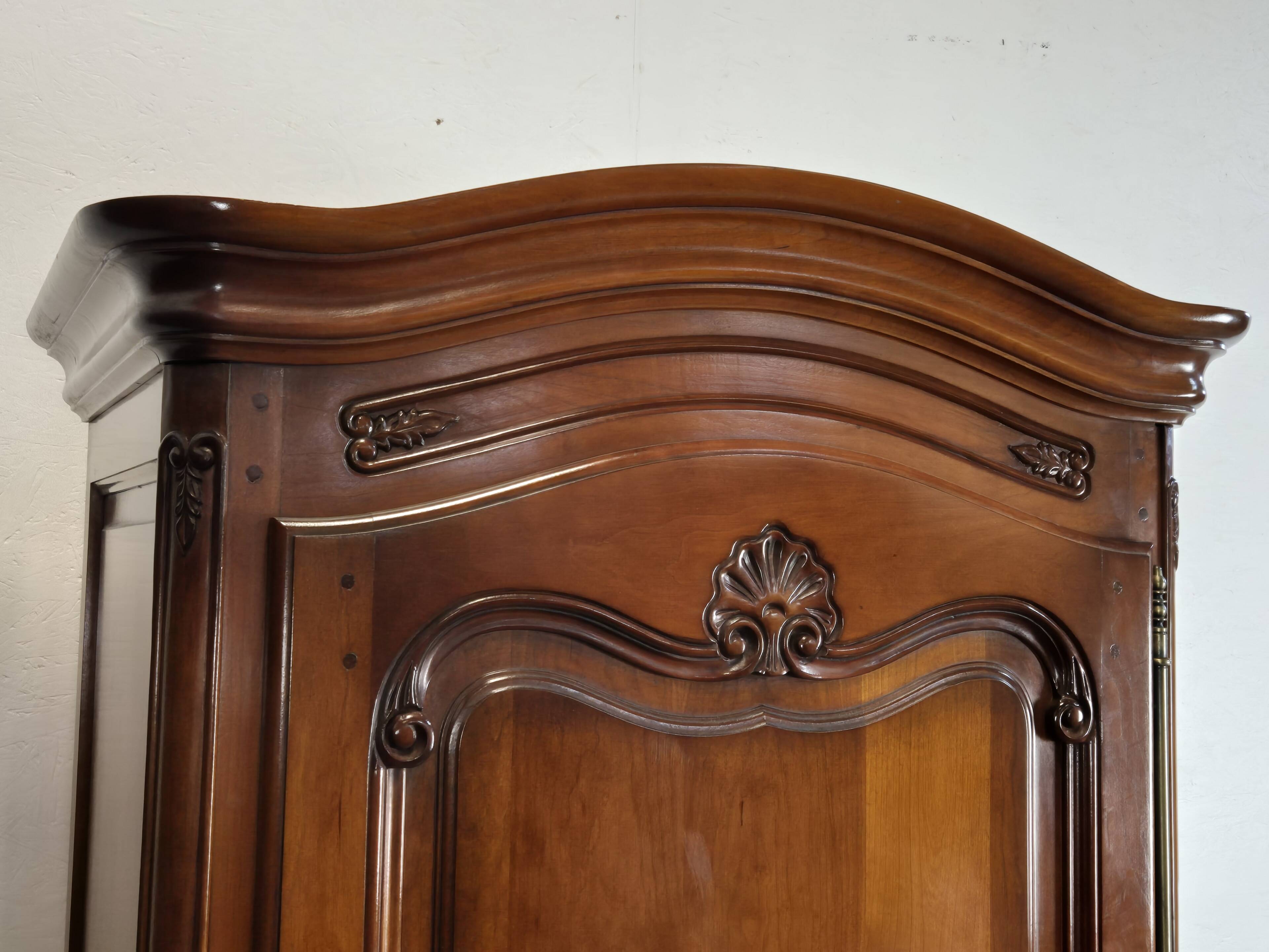 Louis Philippe style bonnetière in cherry wood