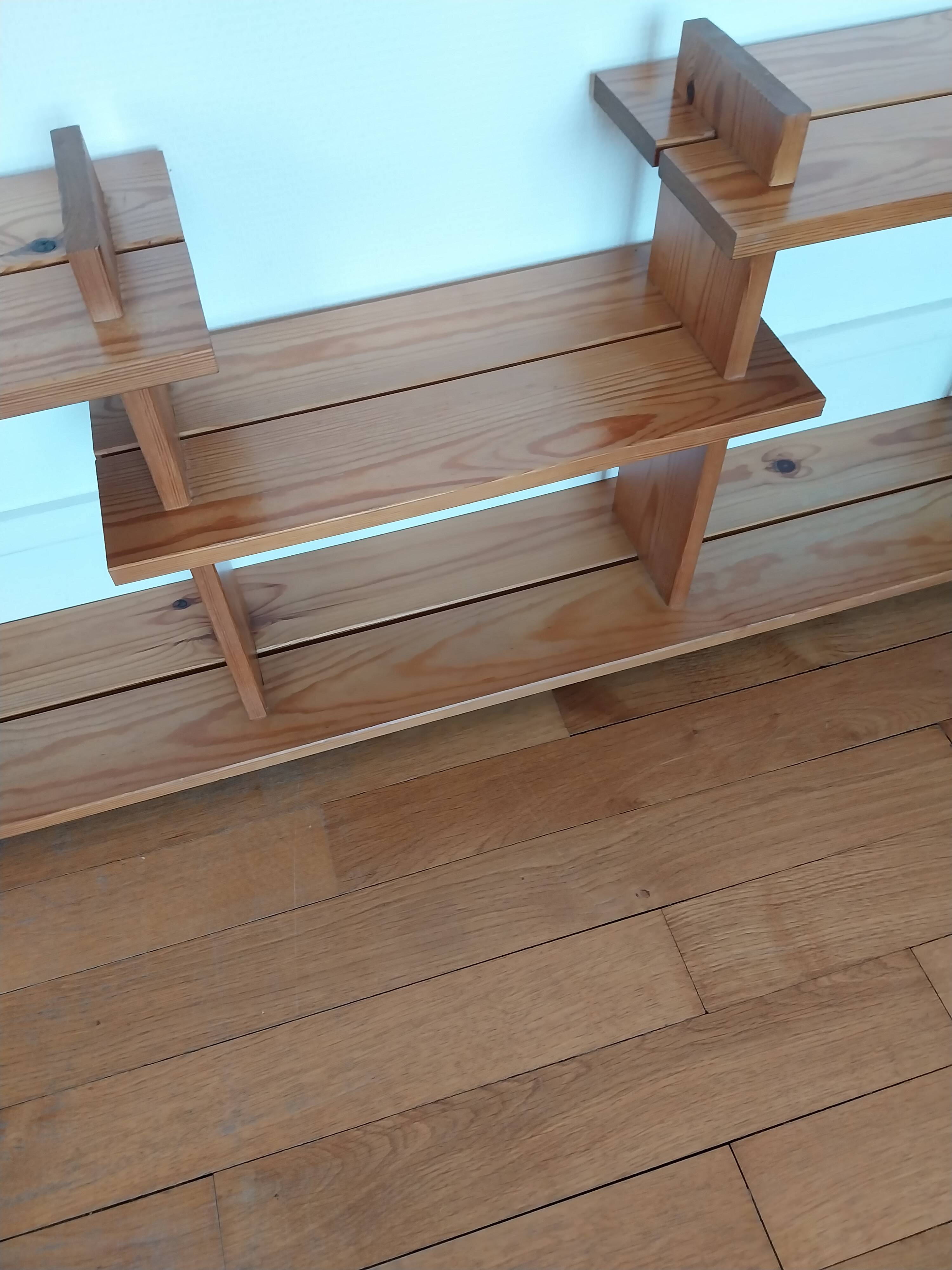 Vintage pine shelves in the style of Maison Regain.