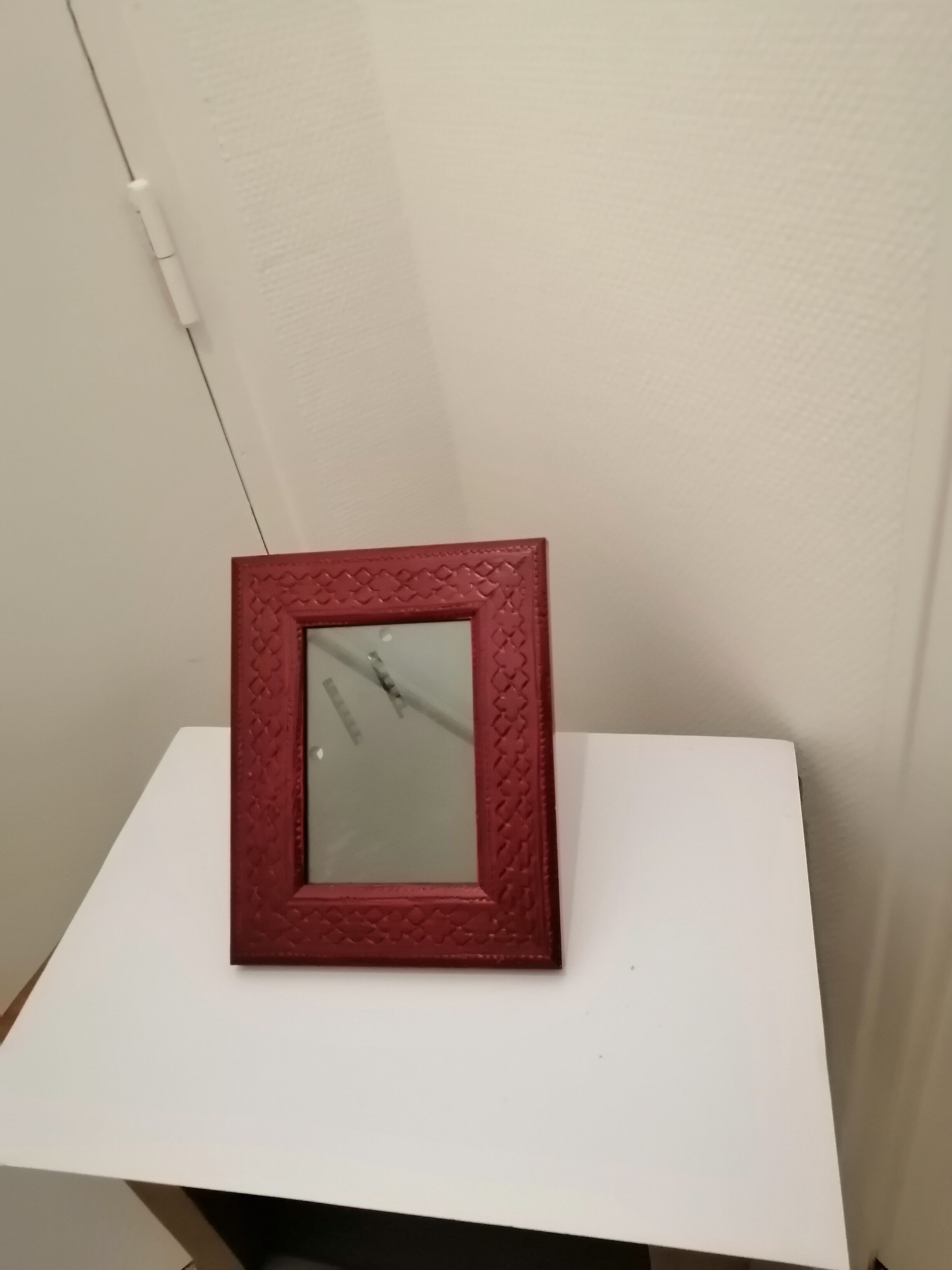 Carved wooden wall frame