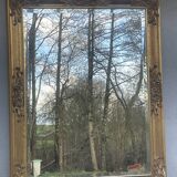 vintage beveled mirror in rectangular shape stucco and gilded wood in Louis XV baroque style
