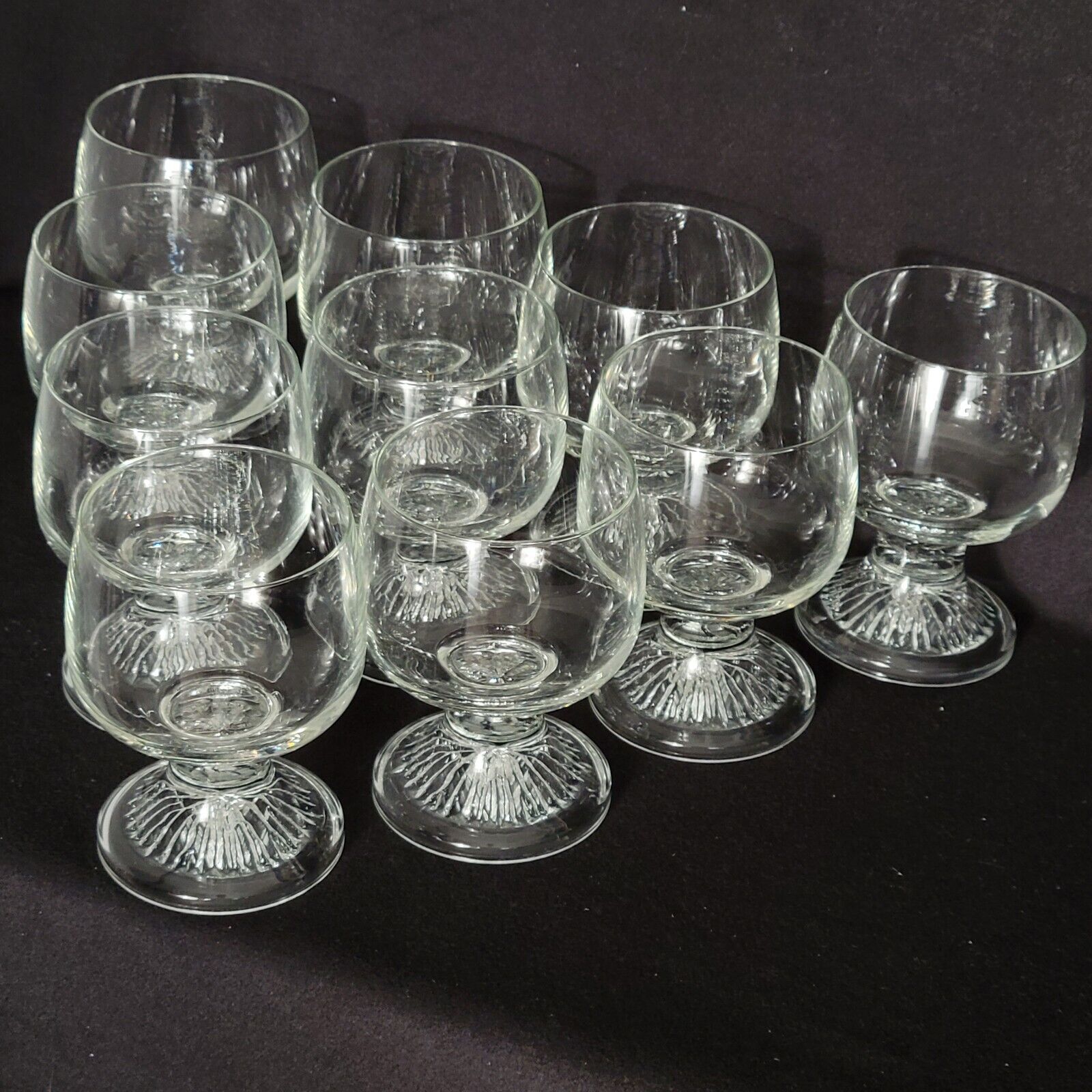10 vintage stemmed glasses in molded glass