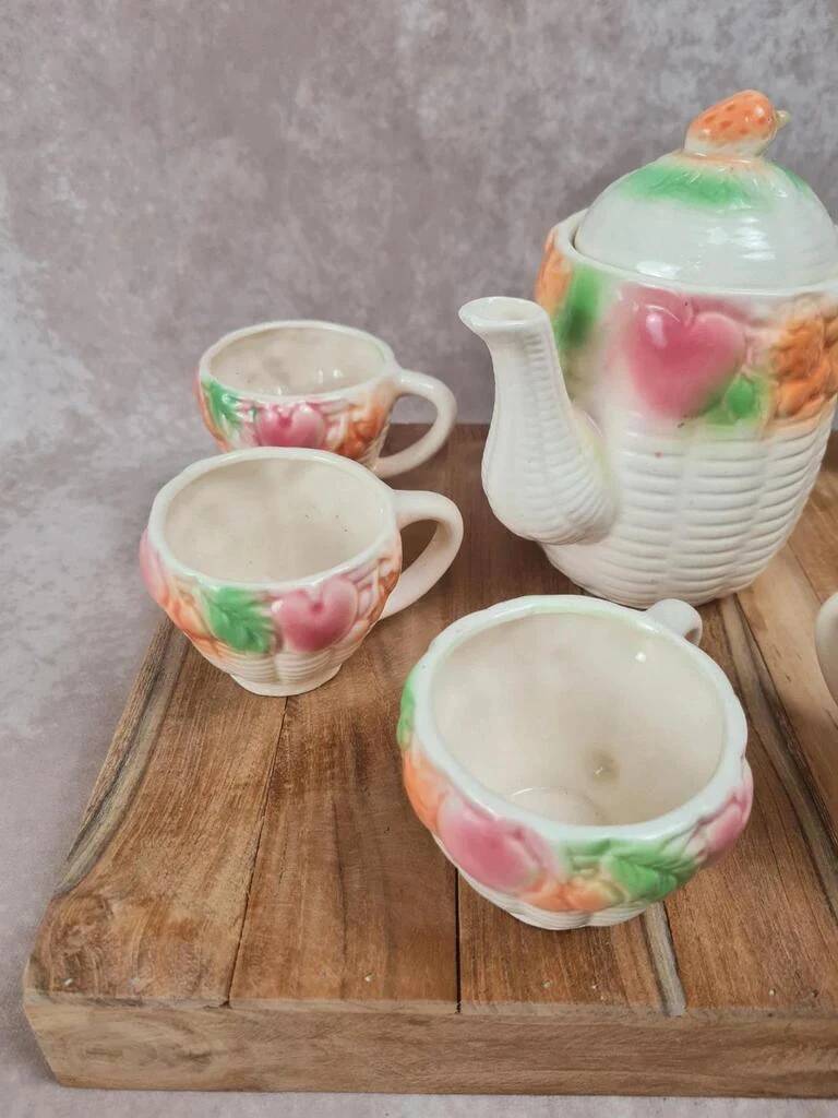Adorable little vintage tea set in coloured earthenware.