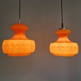 Pair of Space Age pendant lights in orange opaline, Peill & Putzler, 1970