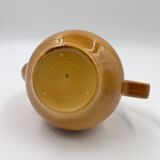 Yellow ceramic teapot