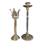 A pair of Art Deco candle holders in silver-plated metal and brass.