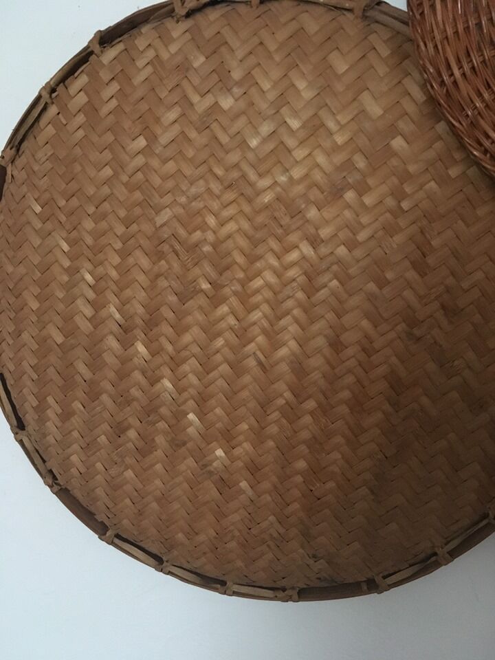 Wall composition of 8 baskets and wicker trays.