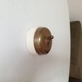 Antique brass and porcelain switch from the 40s/50s