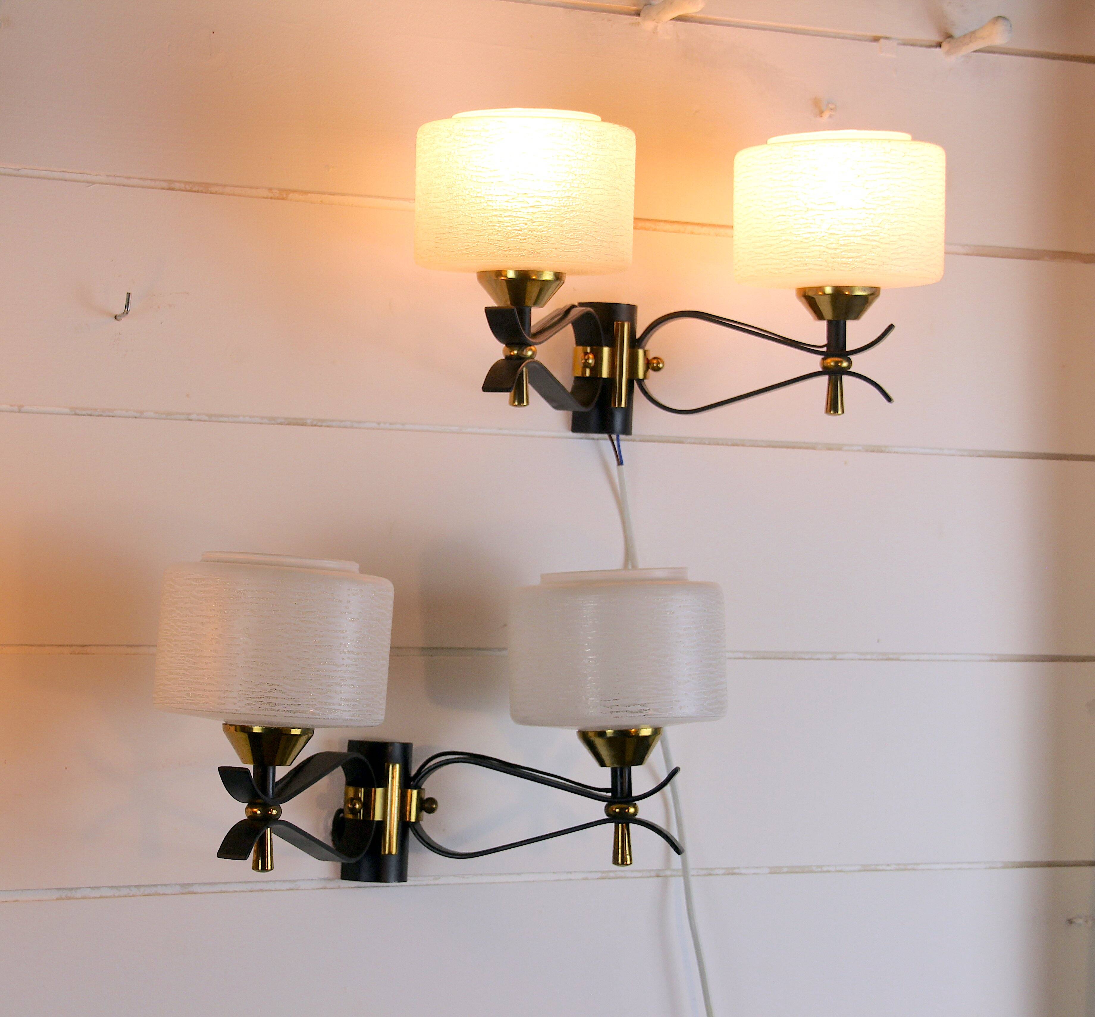 Pair of double wall sconces, Maison Arlus, Mid-Century, black brass opaline