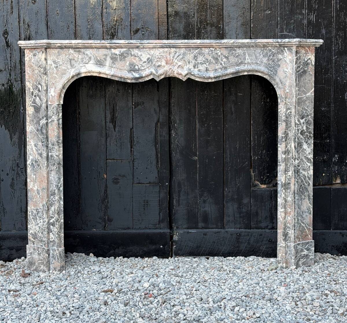 Regency-style fireplace in grey Ardennes marble from around 1900.