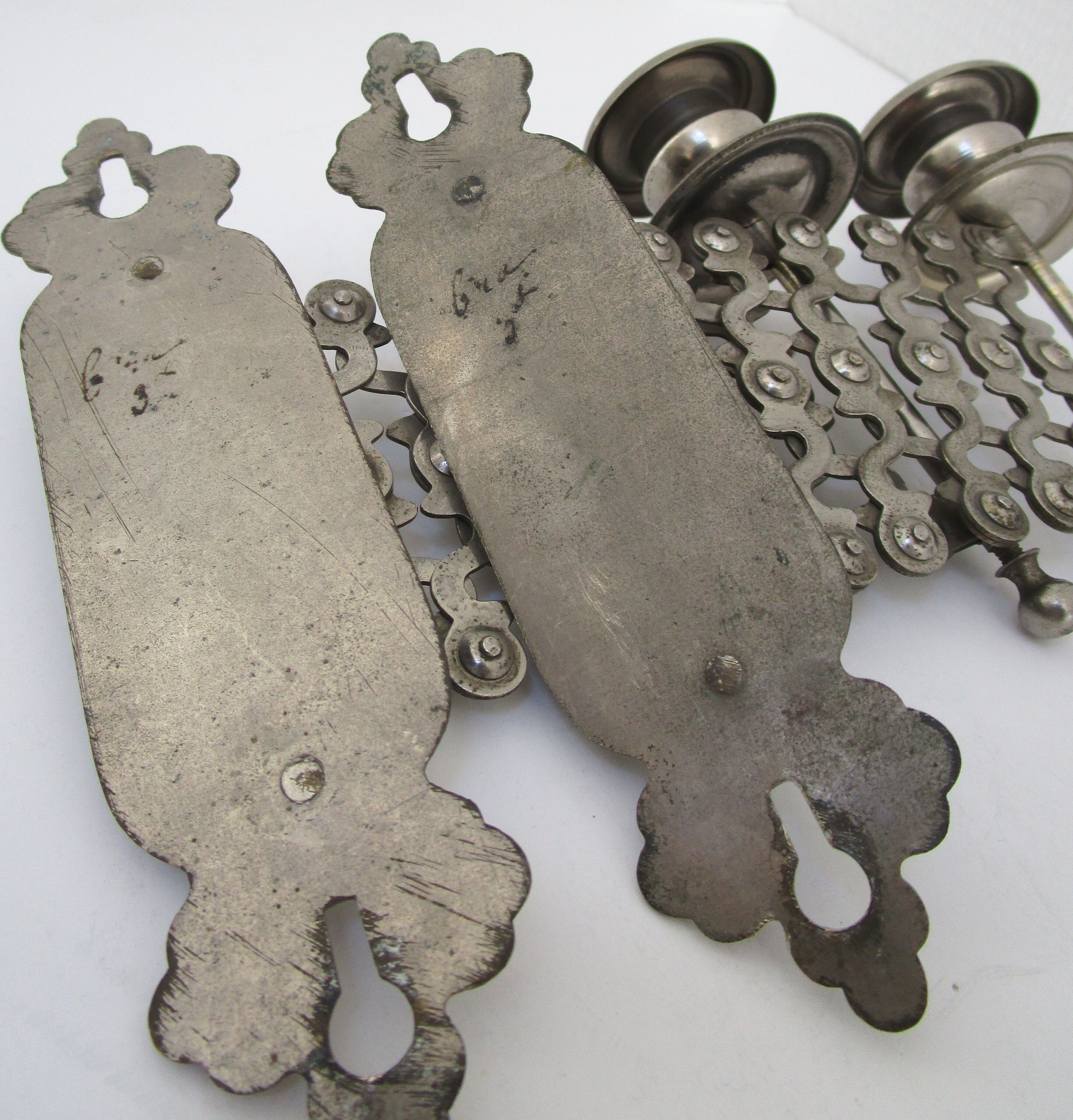 Pair of extendable old metal candlesticks