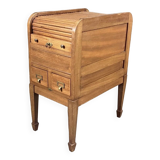 EAGLE in Paris. Wooden archive cabinet opening with two drawers and a curtain.
