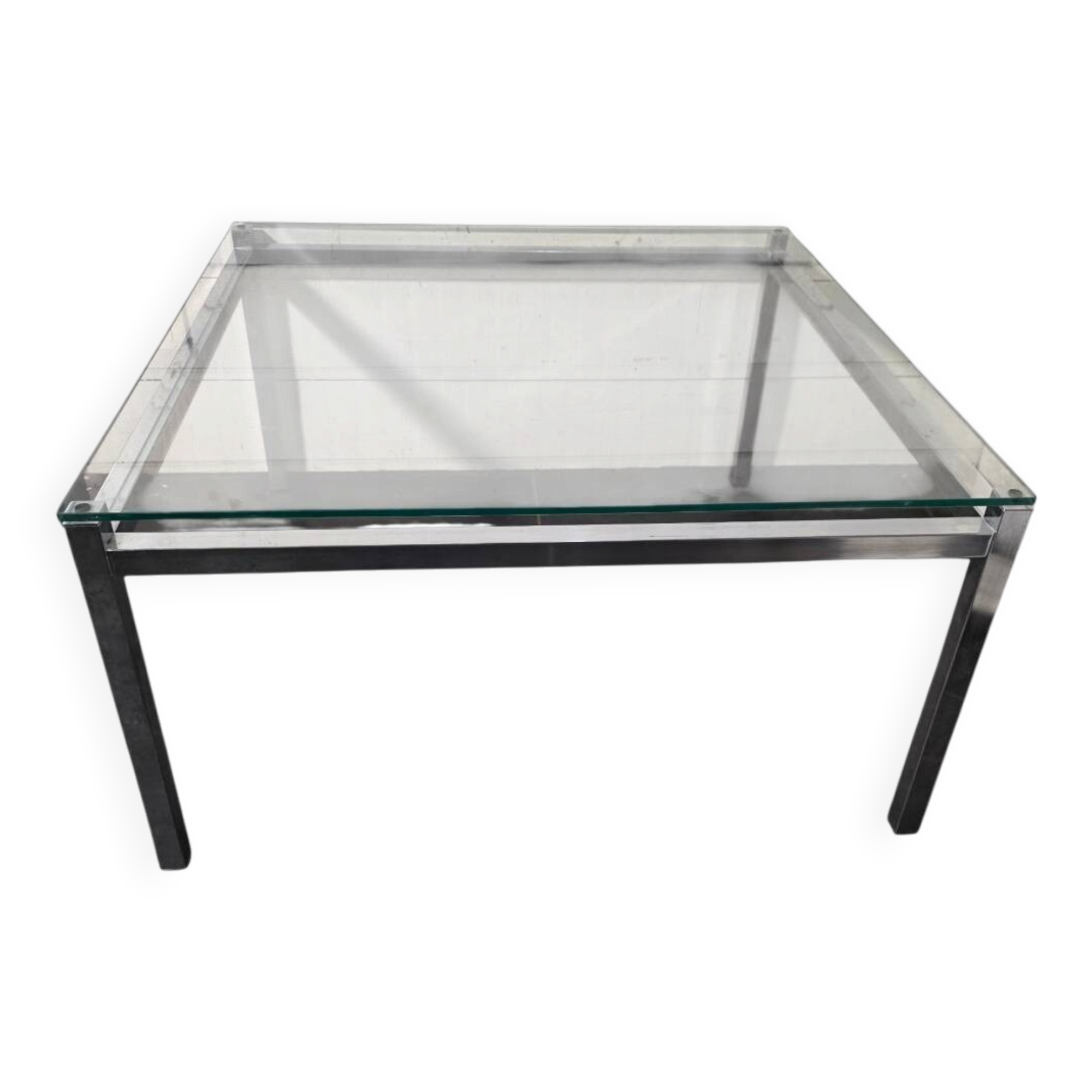 Chrome metal coffee table with a glass top from the 1970s.