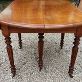 6-foot oval table with caramel patina extensions
