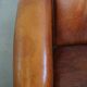Fauteuil club en cuir de mouton couleur cognac