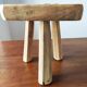 Vintage Danish brutalist tripod stool made of solid oak.