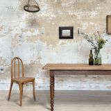 Vintage farmhouse table with turned legs.