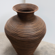 Curved rattan floor vase, Italy 1970.