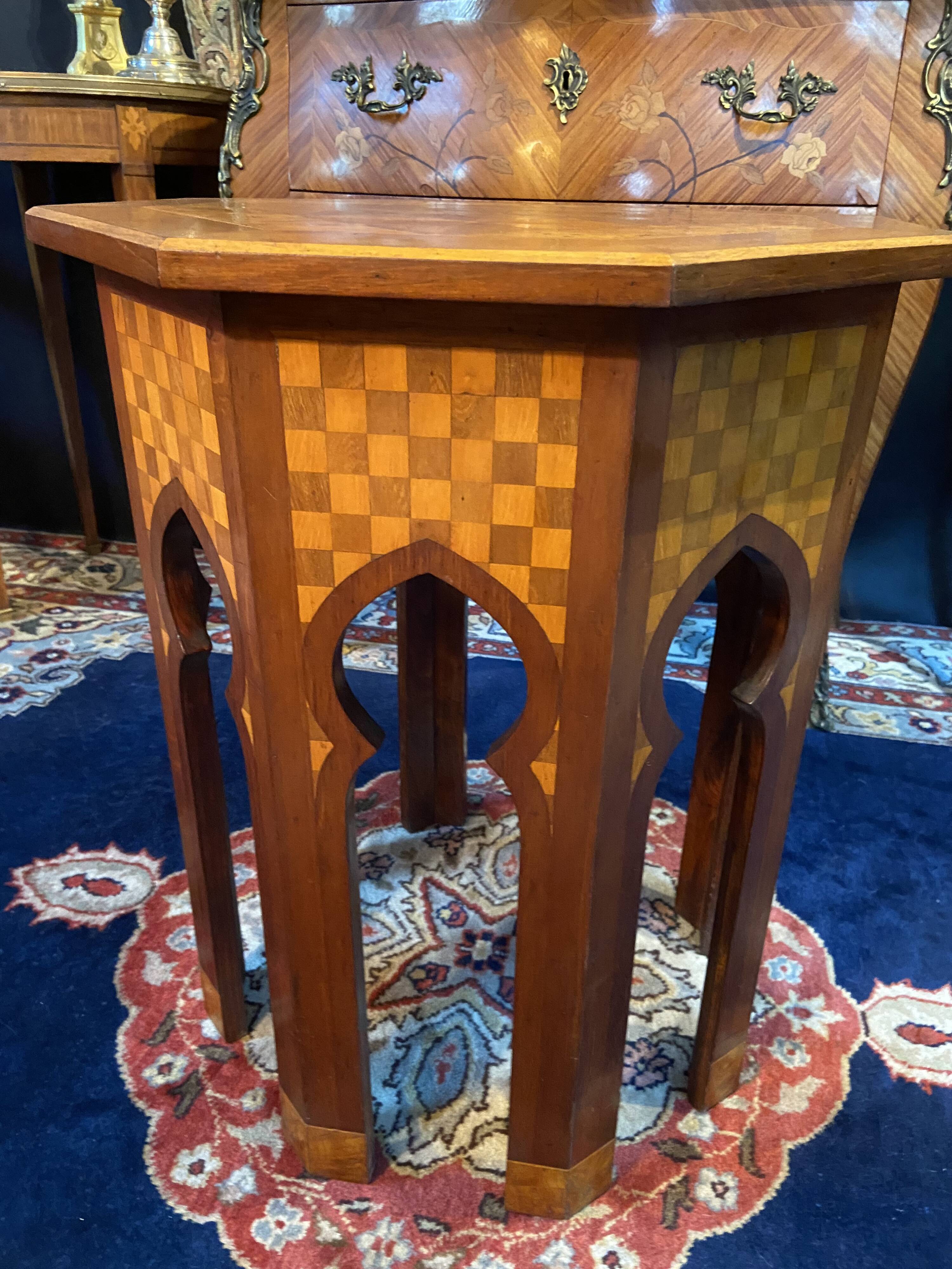 Thuyawood tea table with marquetry decoration.