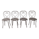 Set of 4 wrought iron chairs.