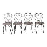 Set of 4 wrought iron chairs.
