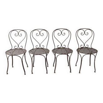Set of 4 wrought iron chairs.