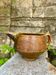 Antique terracotta milk jug